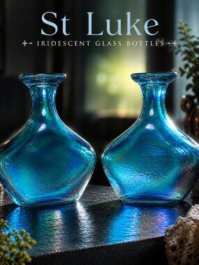 Vintage St. Luke Iridescent Glass Bottles Set of 2 Blue Carnival Style Decor